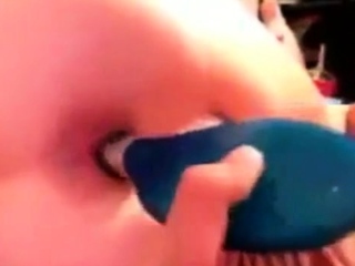 Fucking her ass with hairbrush